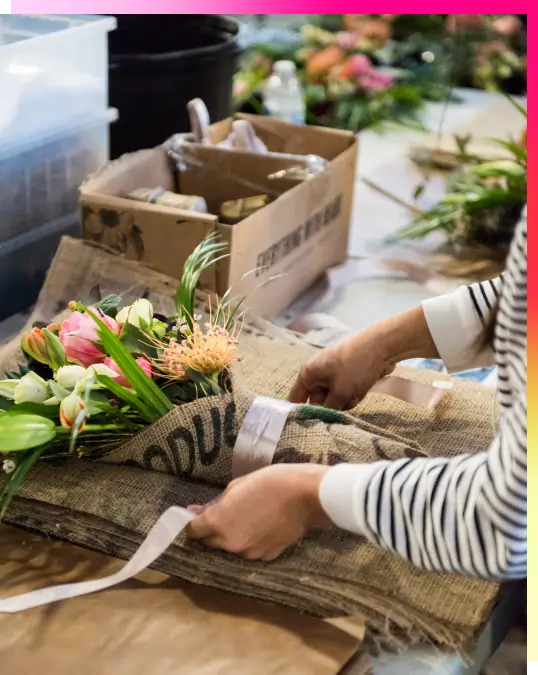 Flower Bouquet Wrapped in Brown Paper Kept by - Stock